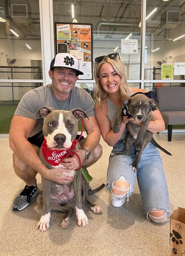 Ashley Smith with husband and dogs