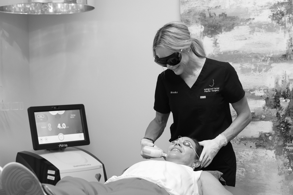 Provider administering laser skin resurfacing