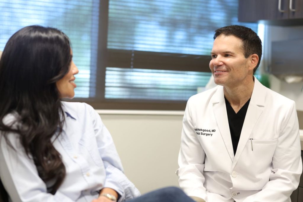 Dr. Hobgood consulting with a client